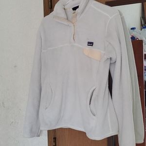 Patagonia sweater white and cream color.
